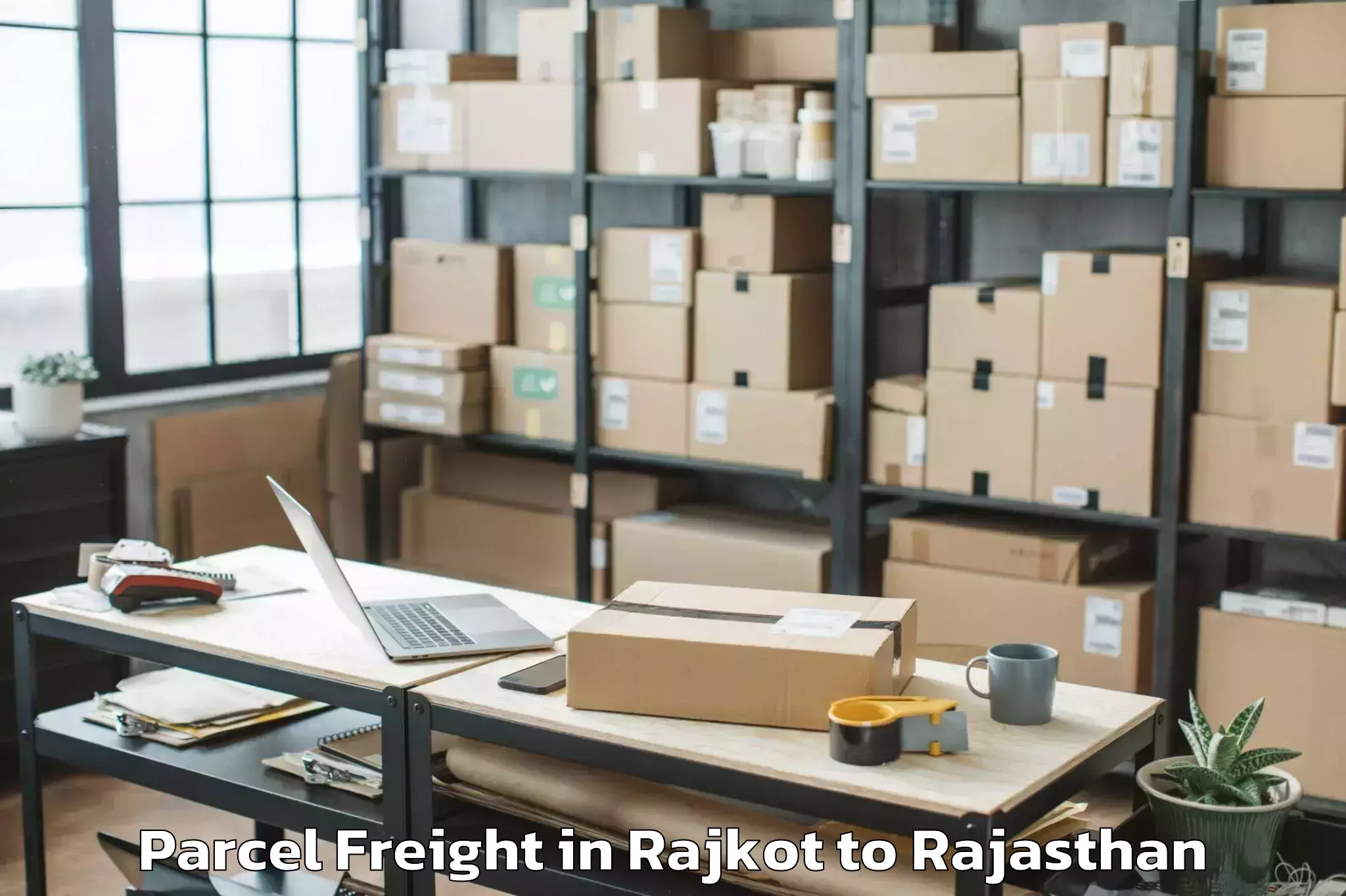 Expert Rajkot to Padampur Sri Ganganagar Parcel Freight